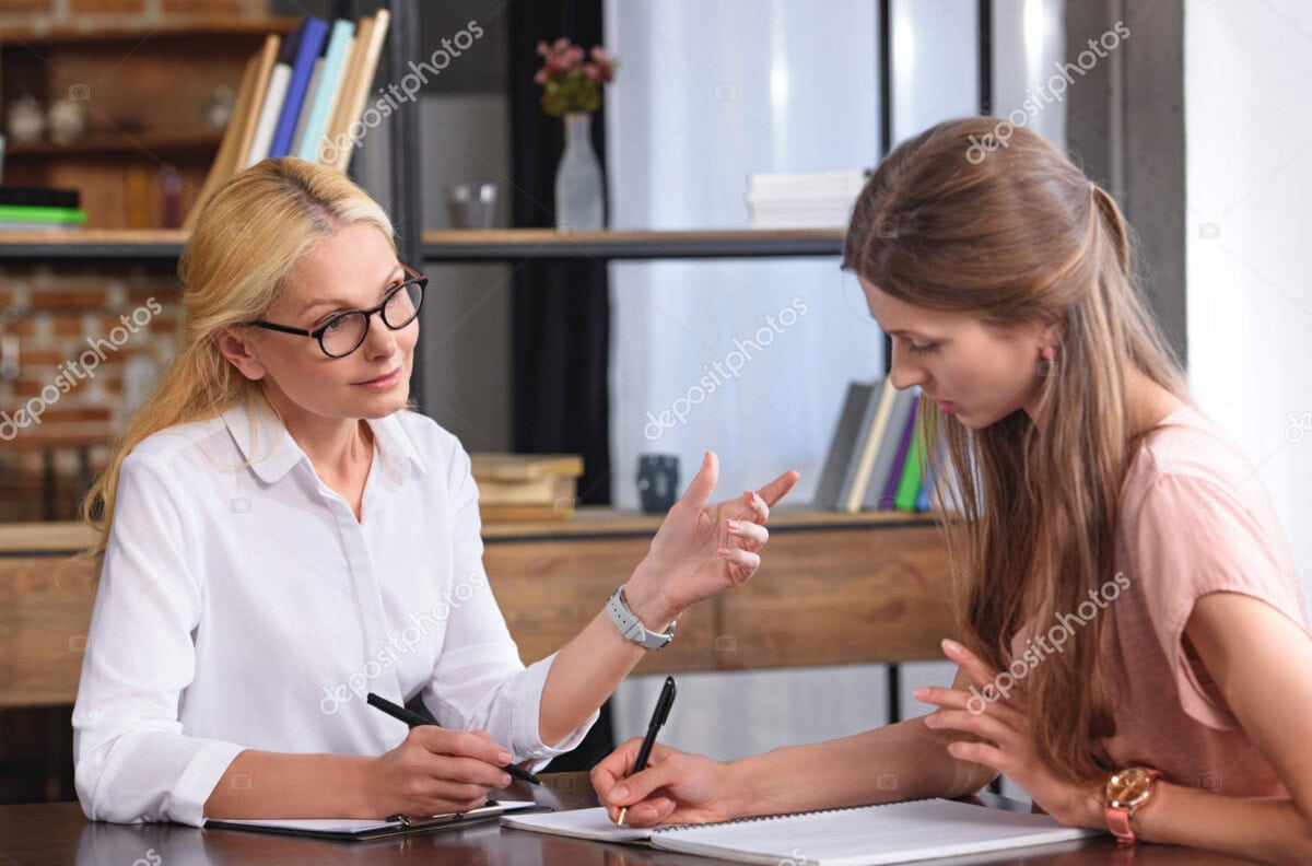 depositphotos 201050856 stock photo counselor gesturing hand talking female